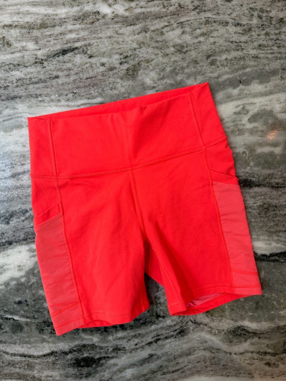 Fabletics Bright Coral High-Rise Bike Shorts
Size XS
